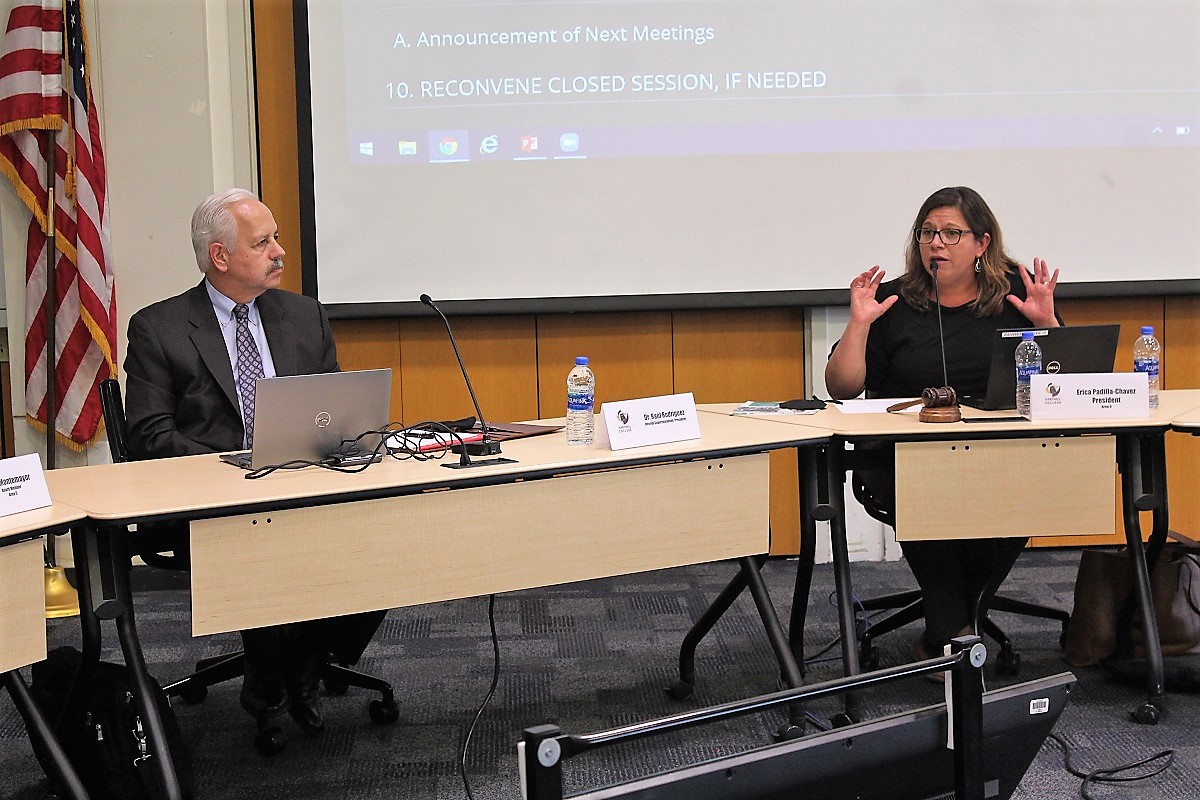 Dr. Raul Rodriguez listens as Governing Board President Erica Padilla-Chavez speaks during the Sept. 21, 2021, board meeting.